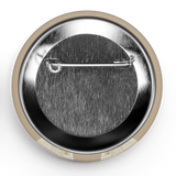 Metallic button badge with a pin on a white background