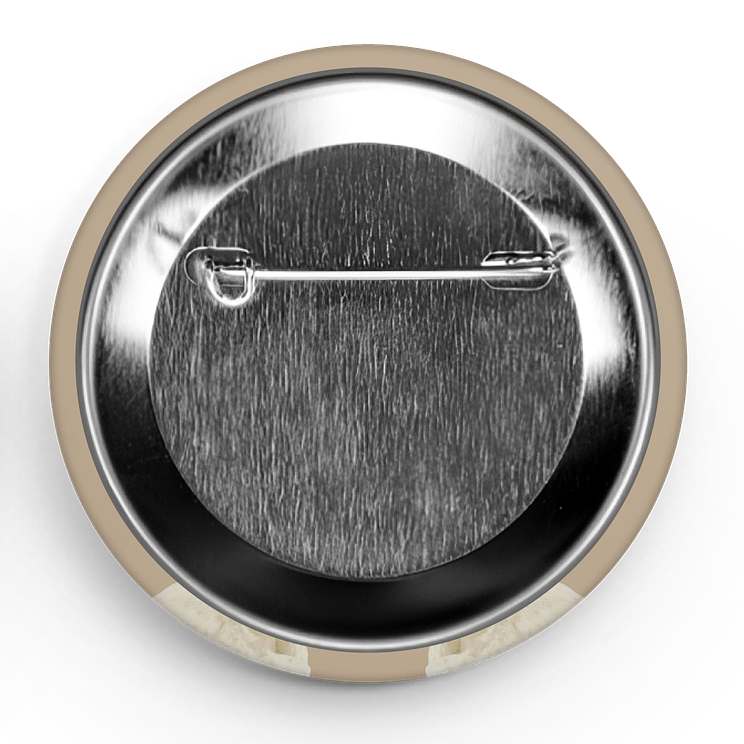 Metallic button badge with a pin on a white background